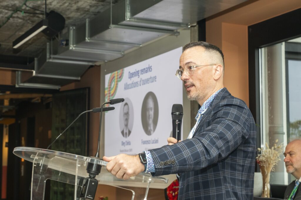 Oleg Chirita with a microphone in his hand.