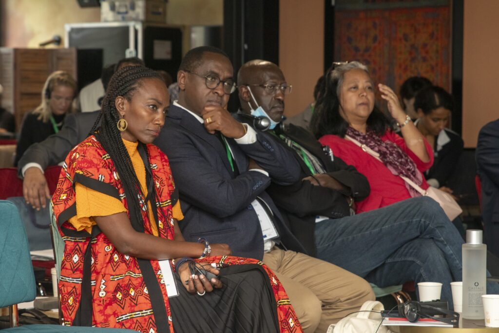 People following attentively what is being said at a conference.