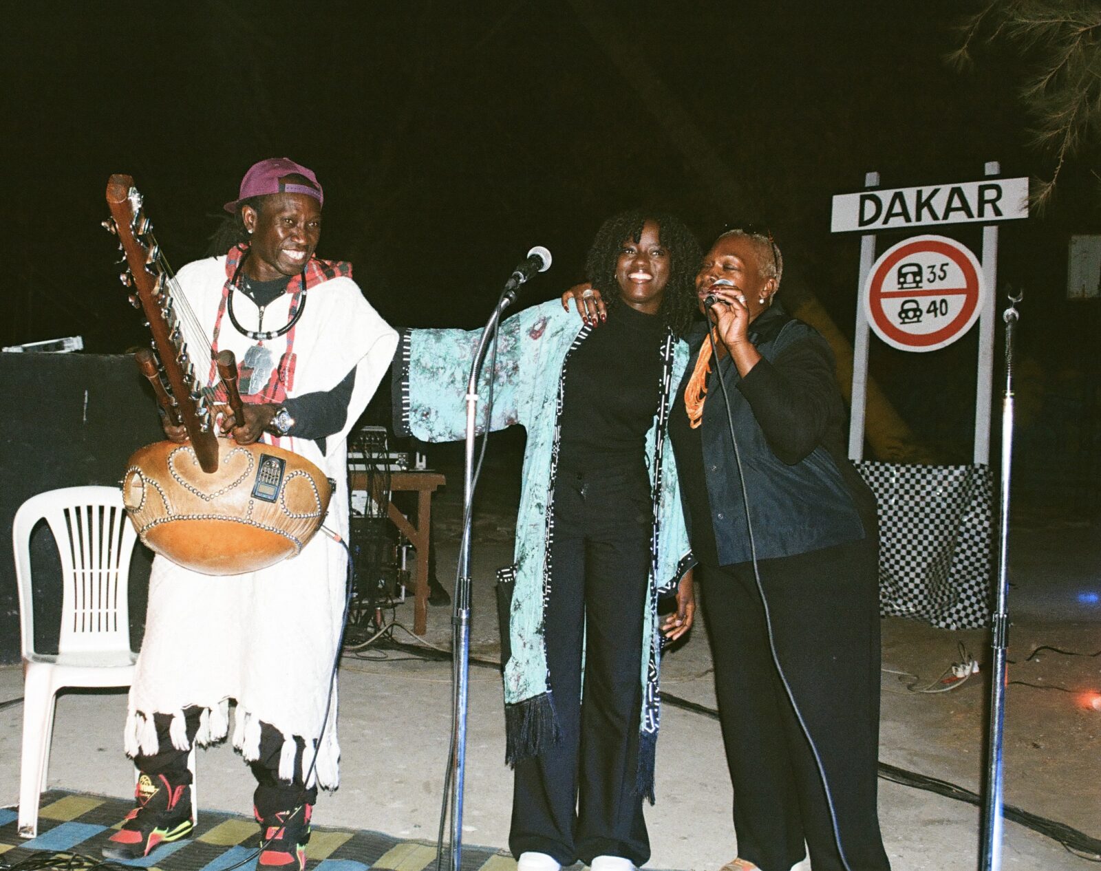 Image of three black musicians celebrating